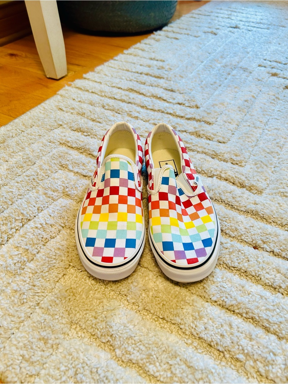 Vans Classic Slip-On Checkerboard Sneakers in Rainbow Red, Yellow, Blue